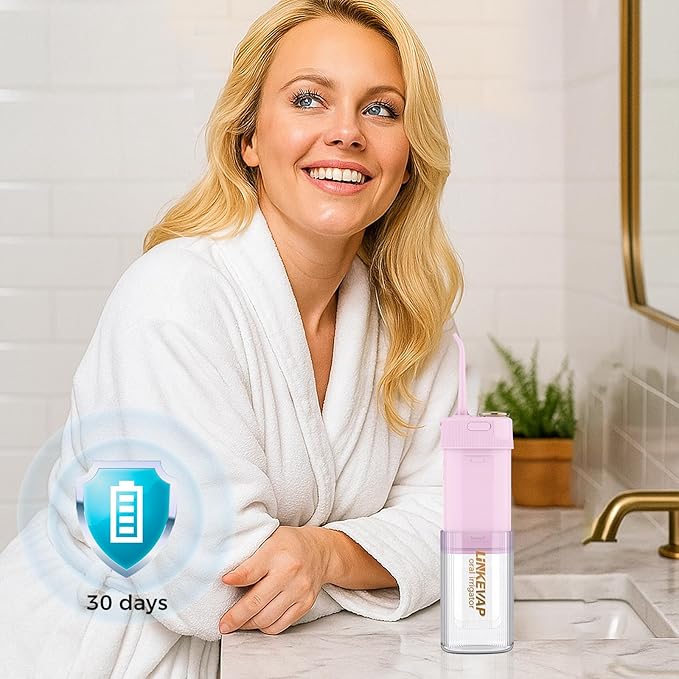 LINKEVAP Portable Water Flosser for Teeth Cleaner Pick Battery Powered Oral Irrigator for Teeth CleaningDaily Dental Care for Home and Travel180 ML Telescopic Water Tank (Light Pink)