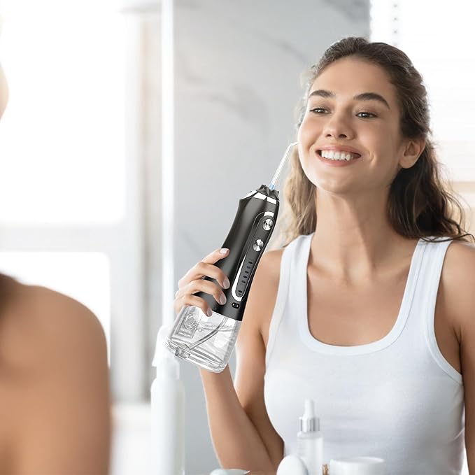 Portable Water Dental Flosser Cordless Rechargeable Dental Oral Irrigator IPX7 Waterproof Teeth Cleaner with 5 Modes 5 Nozzles 10.14oz Detachable Wate